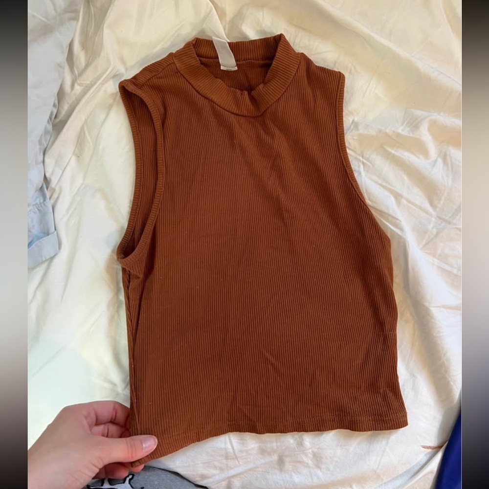 Sleeveless Brown Ribbed Top
Stretchy, but kind of cropped.
